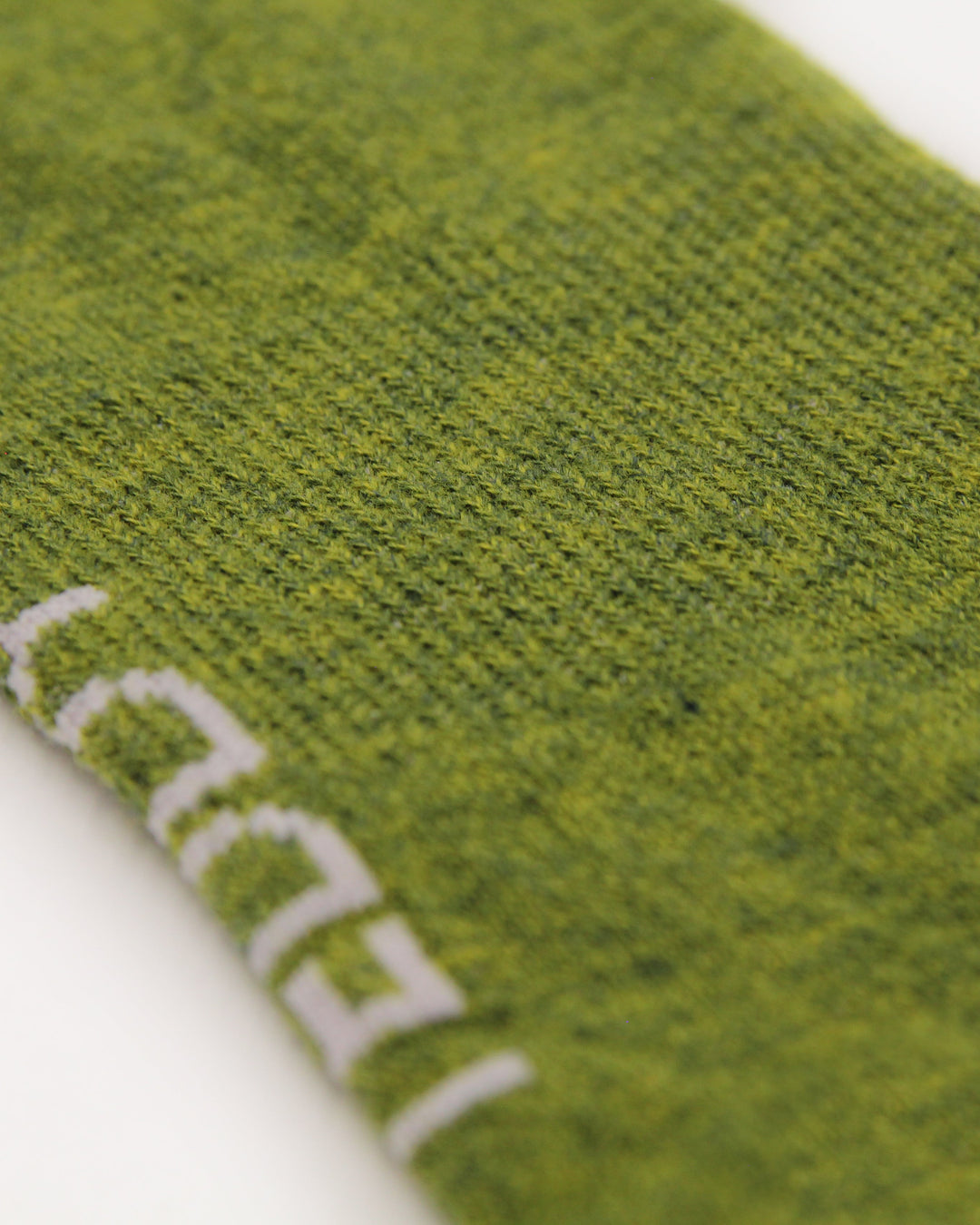 Sustainable moss green running trainer socks with arch support