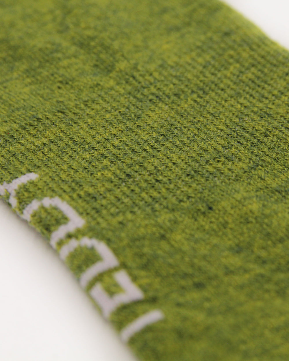 Sustainable moss green boot socks with arch support