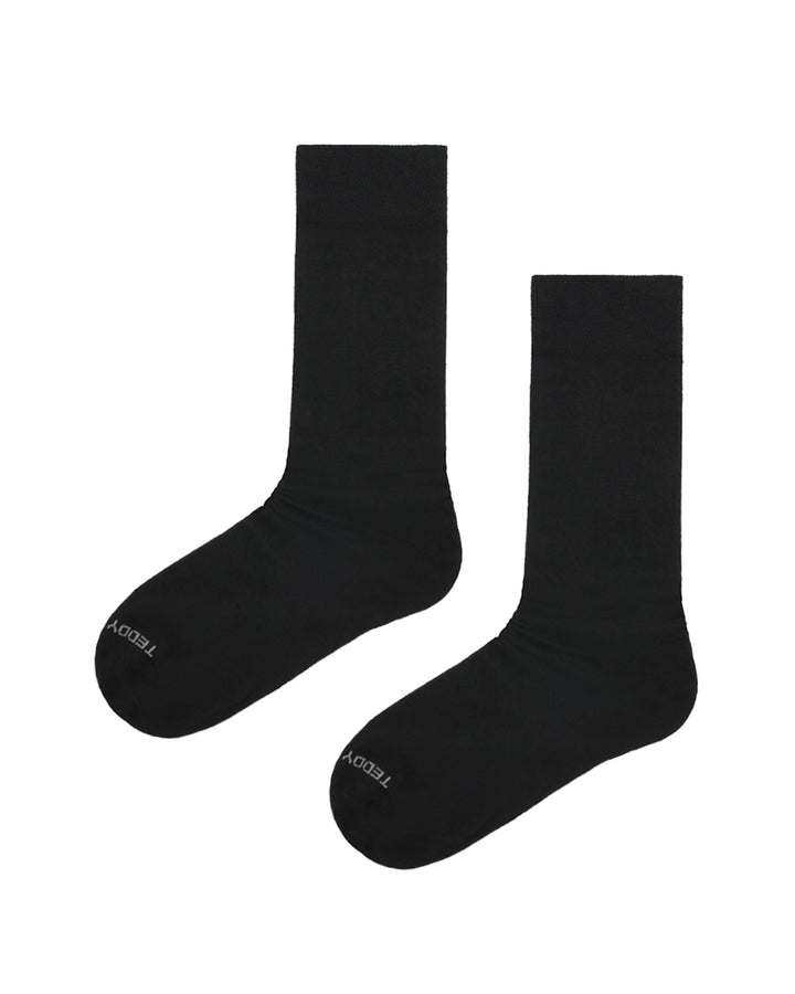 Pair of plain black everyday crew socks