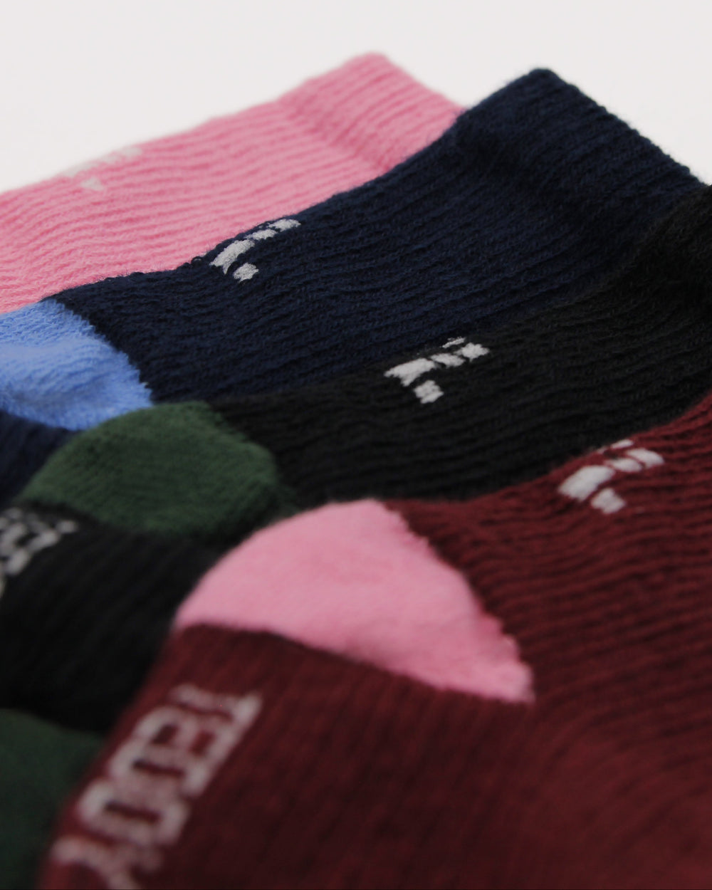 Burgundy, black, navy and pink baby socks from Teddy Locks