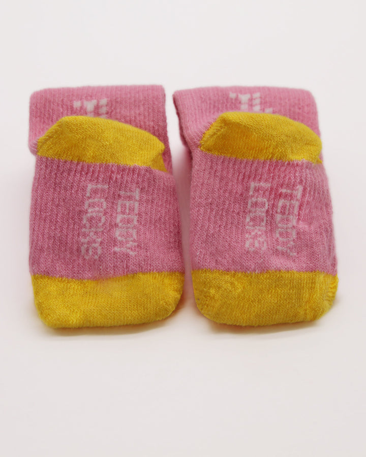 Baby socks in pink and yellow from Teddy Locks