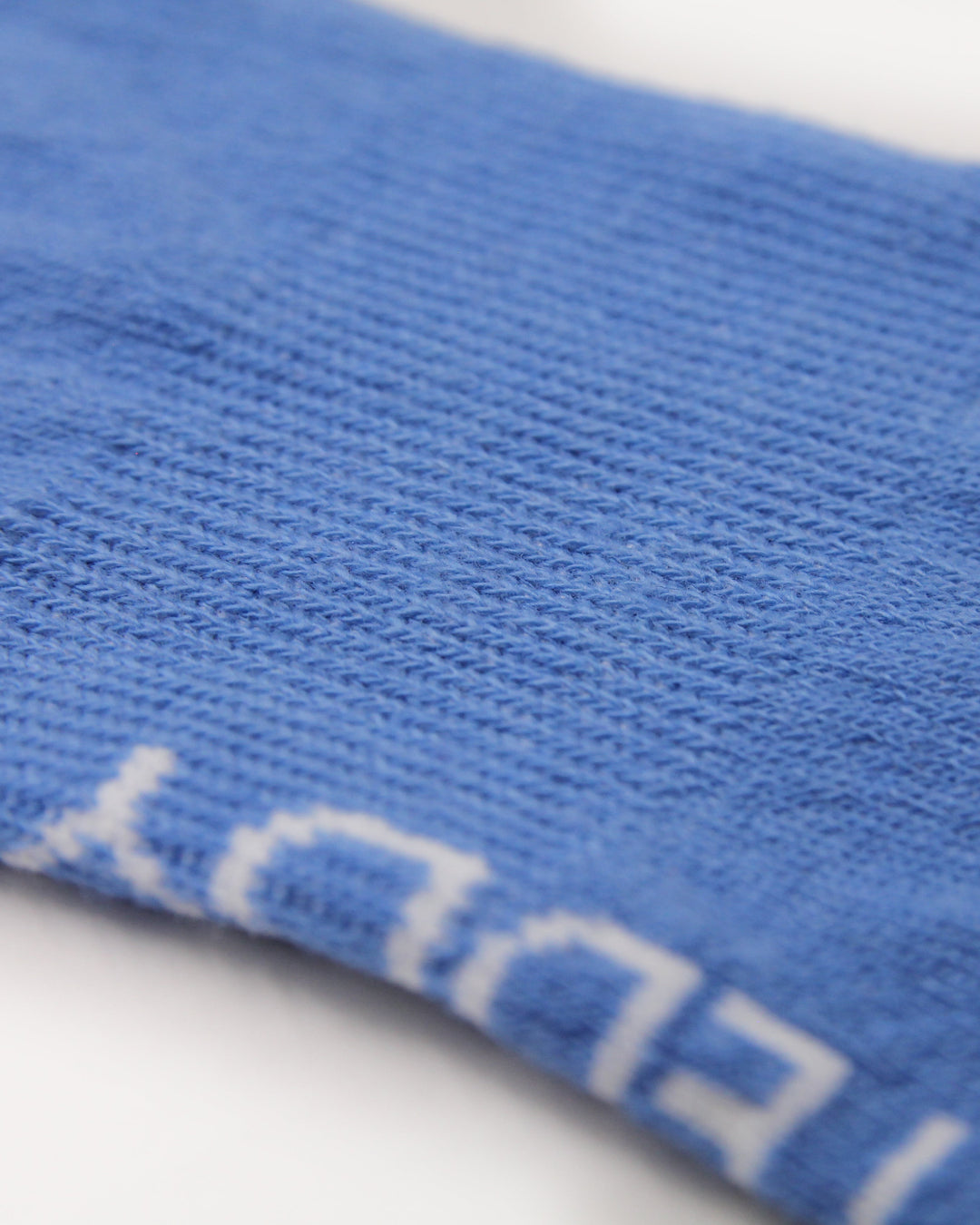 Blue trainer socks with arch support and seamless toes
