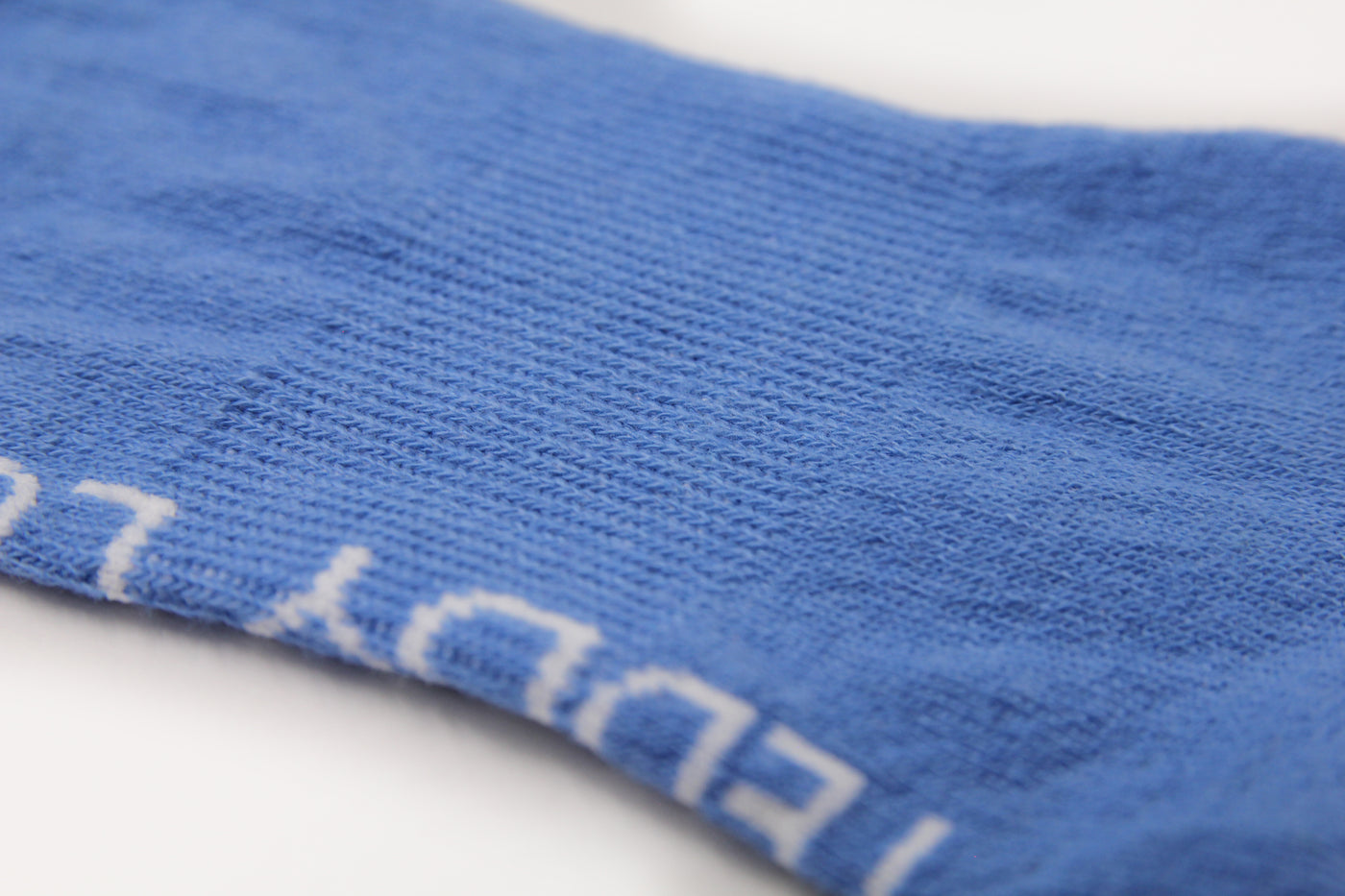Blue trainer socks with arch support and seamless toes