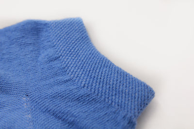Trainer socks that don't slip down. Blue trainer socks made from recycled plastic bottles