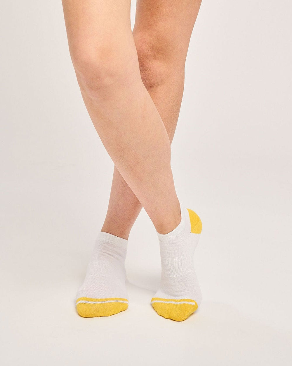 Ecofriendly white trainer running socks. Unisex socks for running