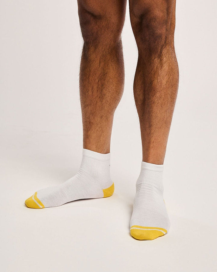 Ecofriendly white tennis socks. Sustainable golf socks