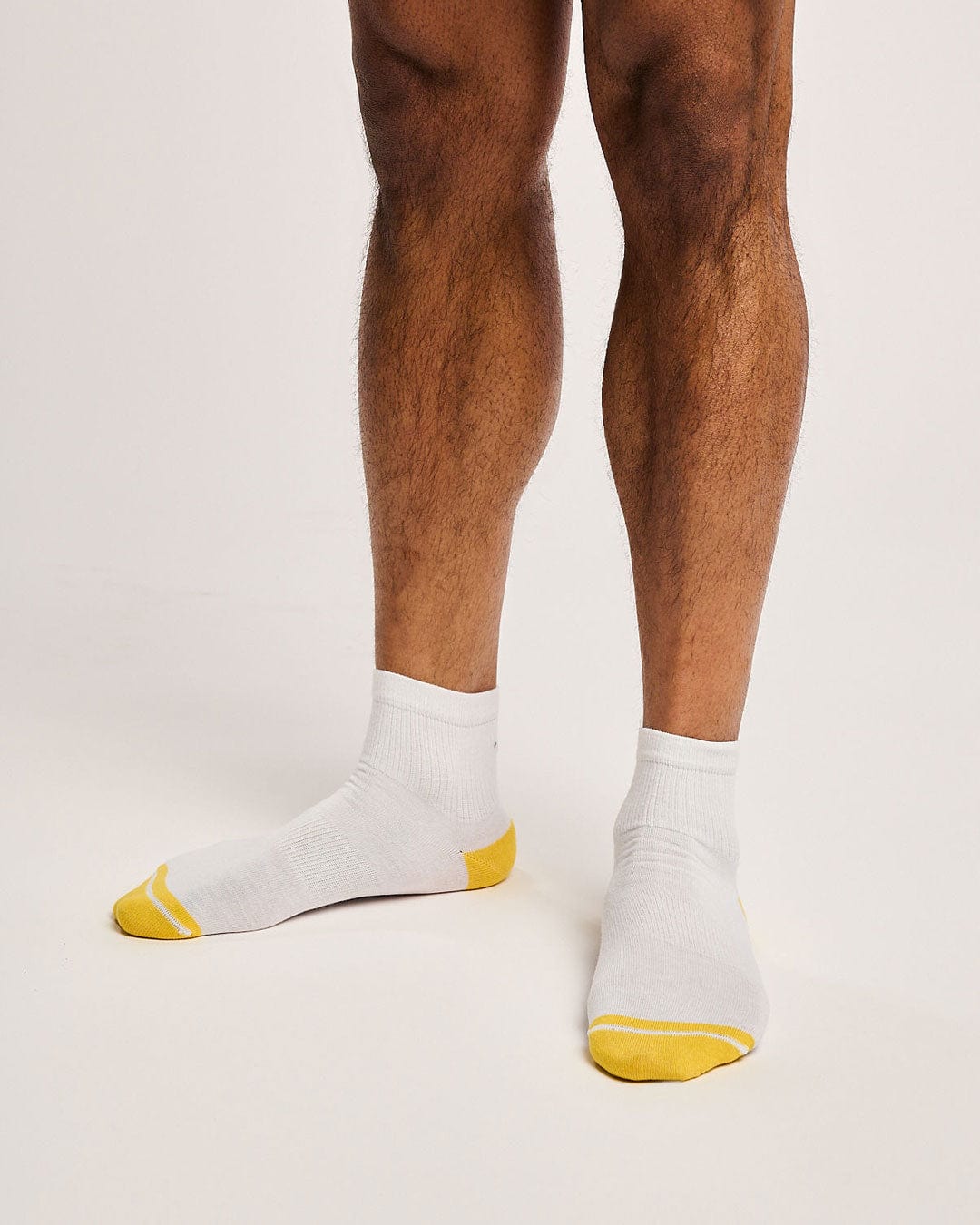 Ecofriendly white tennis socks. Sustainable golf socks
