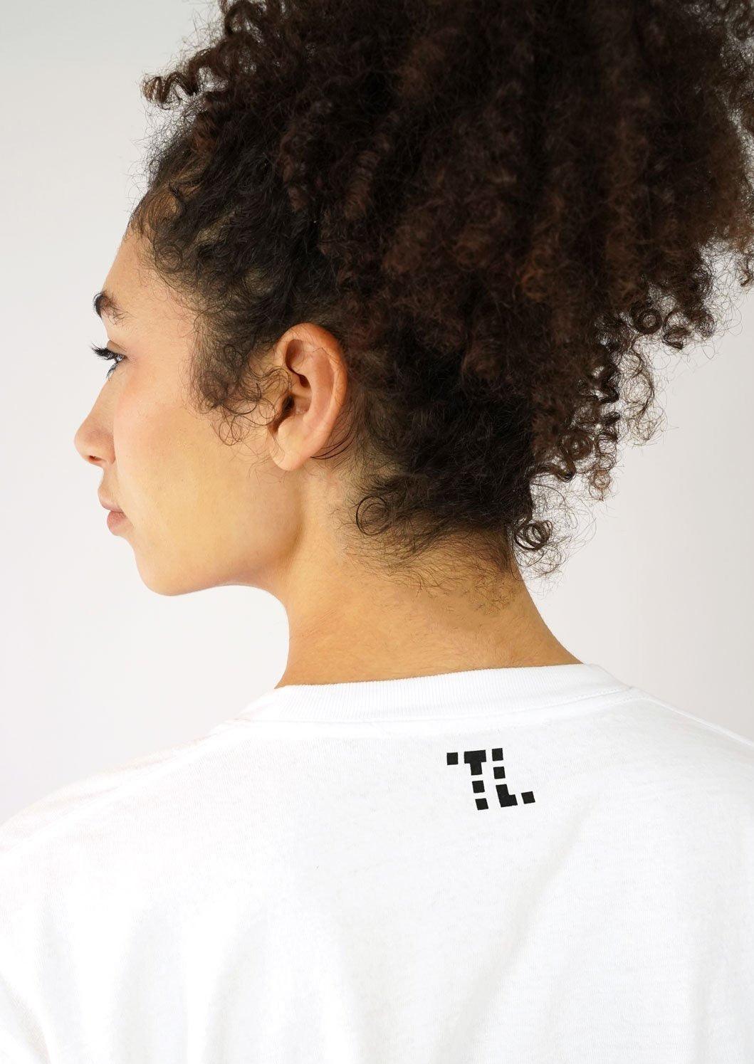 Long sleeve recycled cotton tshirt. Unisex tshirt in white.