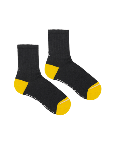 Recycled ribbed crew socks. Unisex crew length socks in charcoal and yellow.