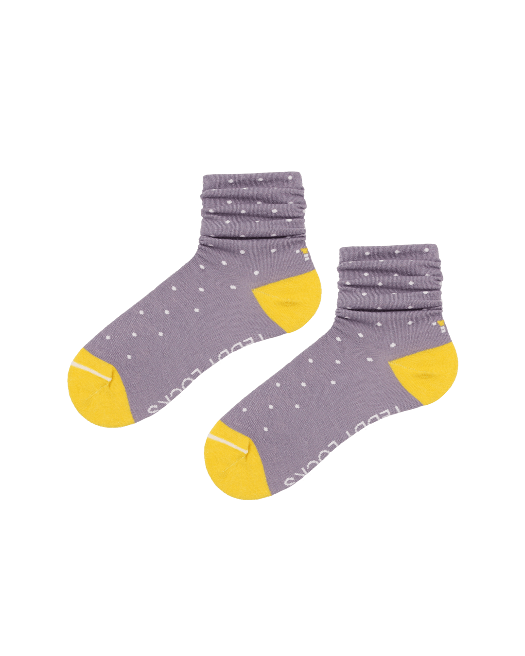 Sustainable socks. Lilac polka dot socks with yellow toes.