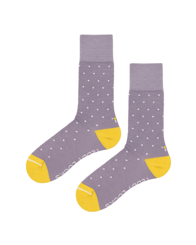 Recycled socks in lilac. Socks with yellow toes and lilac and white polka dots.